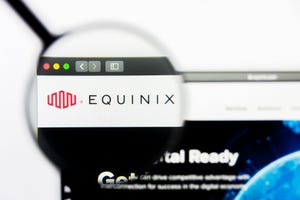 Illustrative Editorial of Equinix website homepage. Equinix logo visible on display screen.