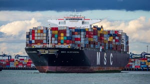 Containers on the MSC Alexandra Container Ship arriving at the Port of Felixstowe UK as part of the global supply chain.