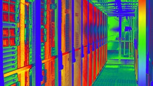 Thermal image of a cold aisle with server racks in a data center.