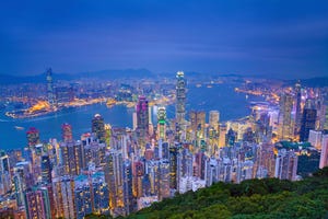 Image of Hong Kong with many skyscrapers during twilight blue hour