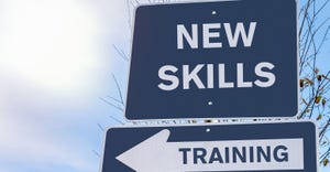 "New Skills" sign on top of "Training" sign