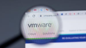 magnifying glass hovering over VMware logo