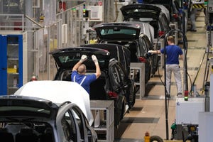 Assembly line for Volkswagen Touareg, Touran, and T-Roc models at the Volkswagen factory in Wolfsburg, Germany. March 2019